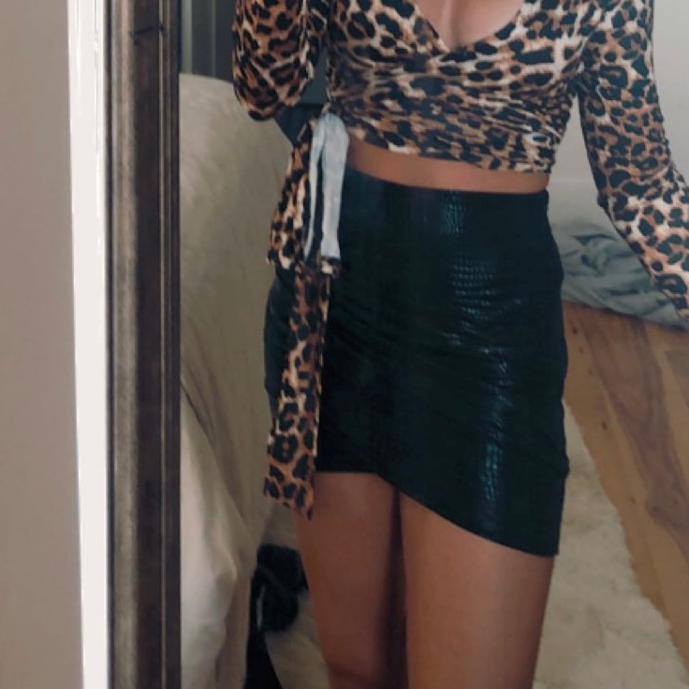 Black snakeskin mini skirt